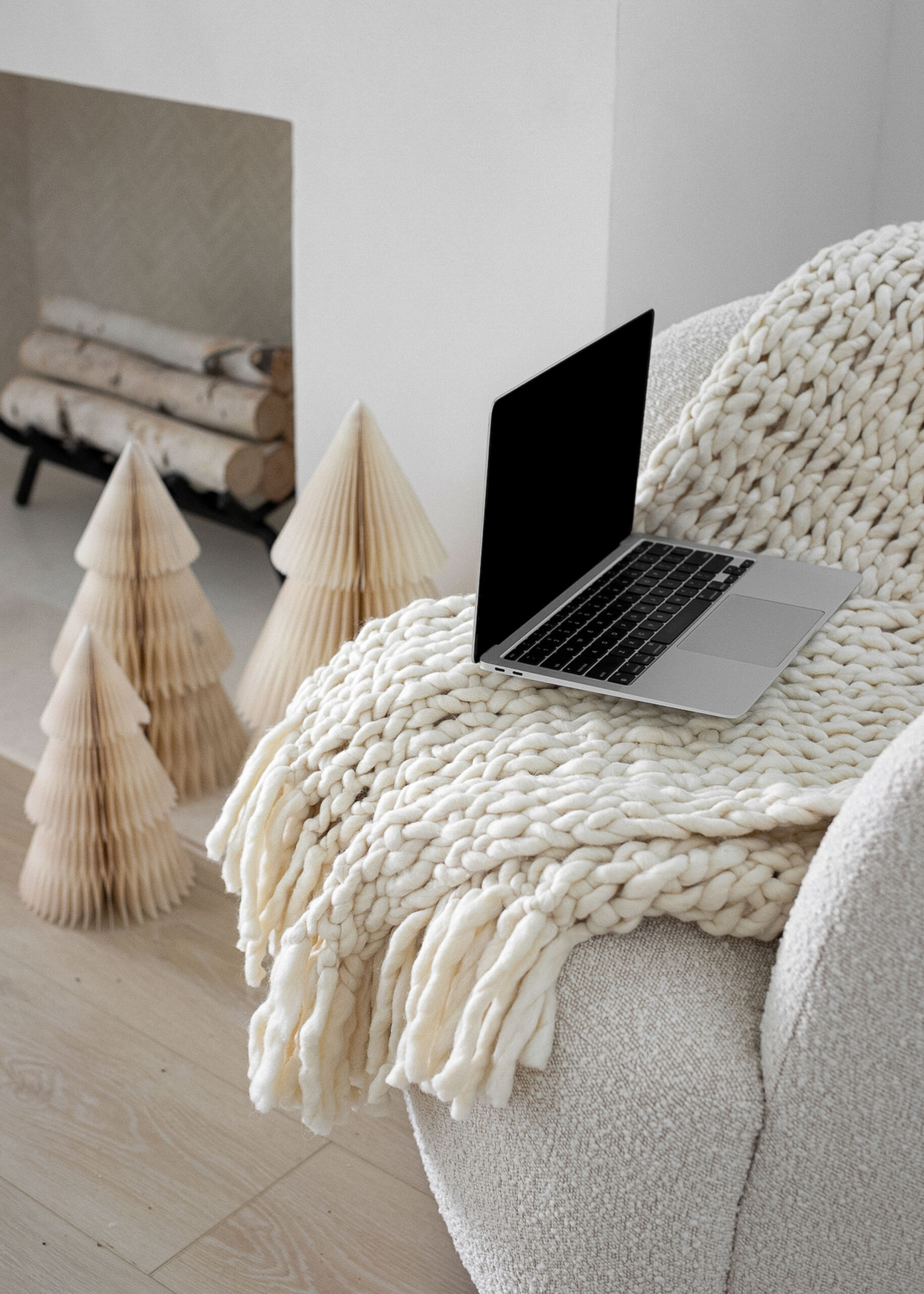 Website Design Checklist image of laptop on a white blanket